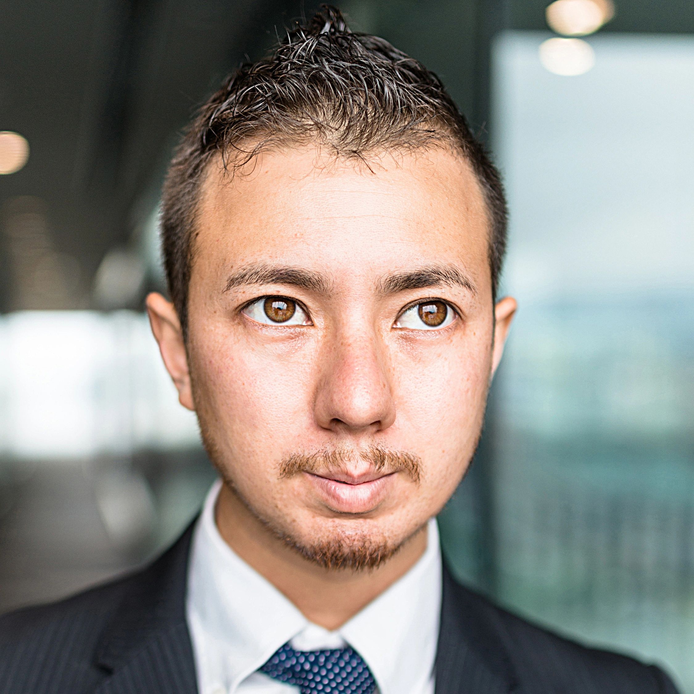 Portrait of Kenji Sato, Innovation Manager